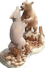 Carved in 2012 features two grizzly bears fighting. 